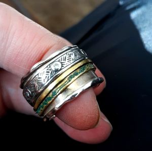 Wide sterling ring with 3 rolling bands